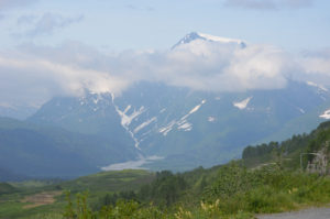 Kids with orange lollys.